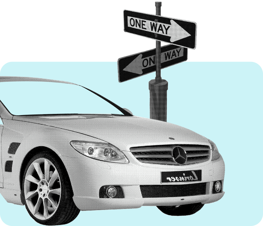 Car at a one way sign