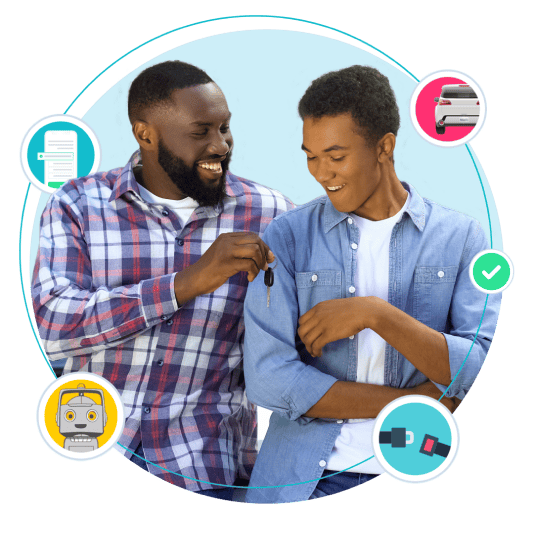 Father handing teen car key