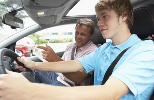 Teen driver doing behind the wheel driving