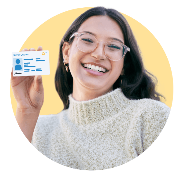 Woman holding a driver's license