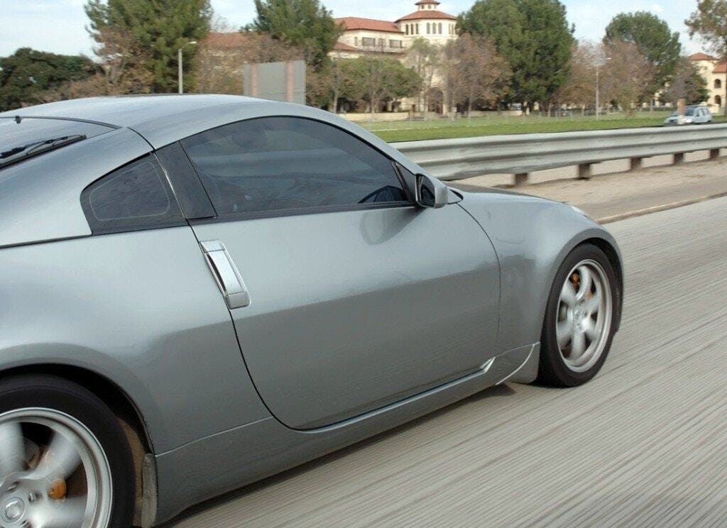 car driving on freeway side view