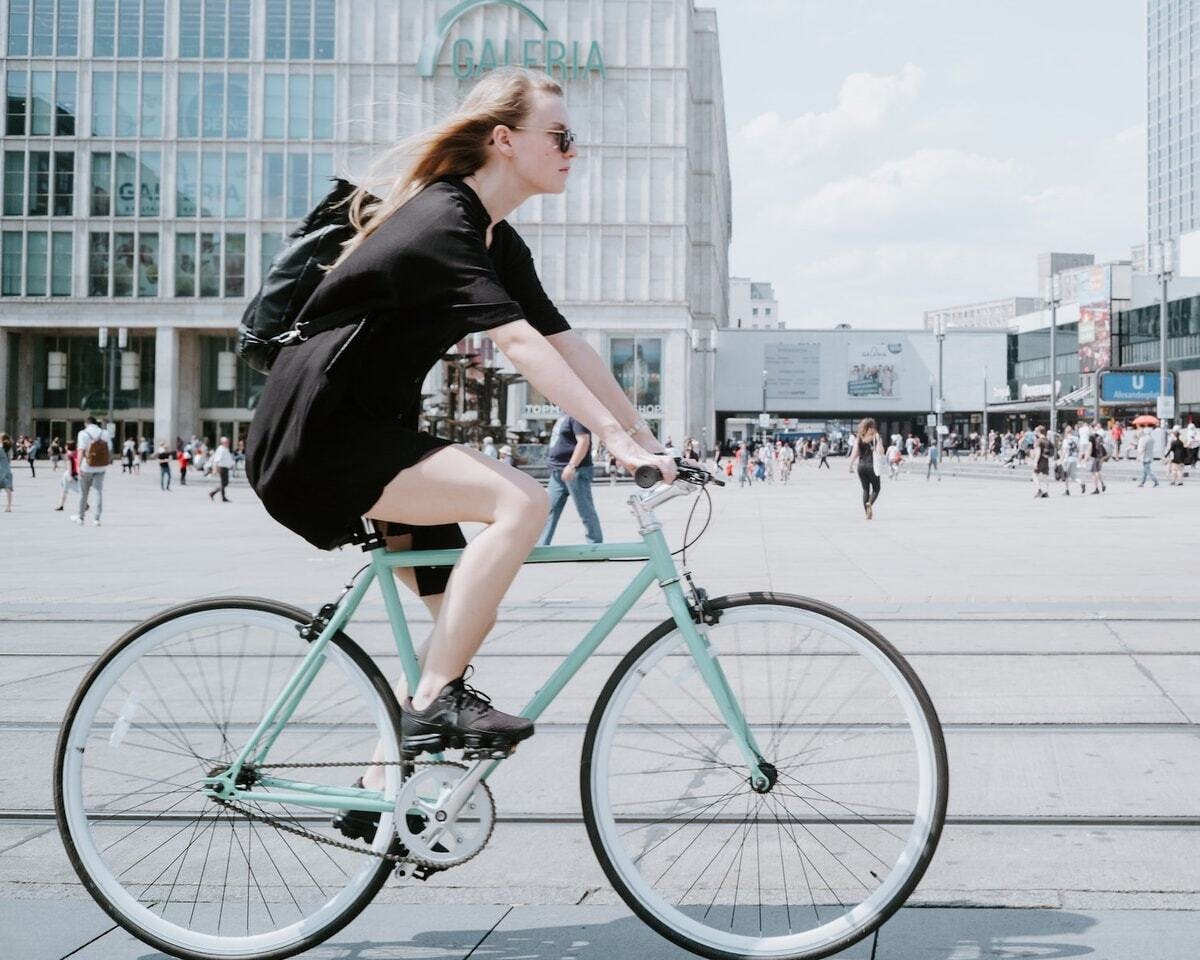 woman riding bike in the city