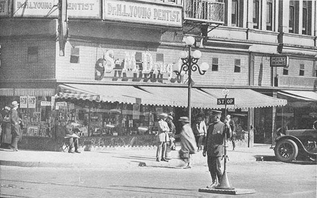 Early traffic signs were manually switched by police officers.