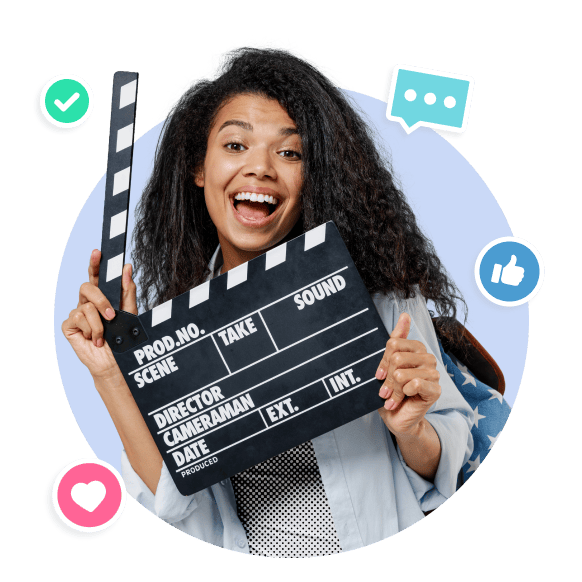 Woman holding a clapperboard