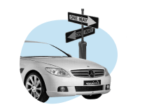 car at one-way sign