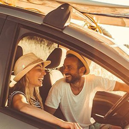 Couple laughin in a car