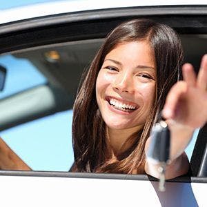 Smiling Driver holding keys