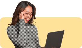 woman smiling at laptop