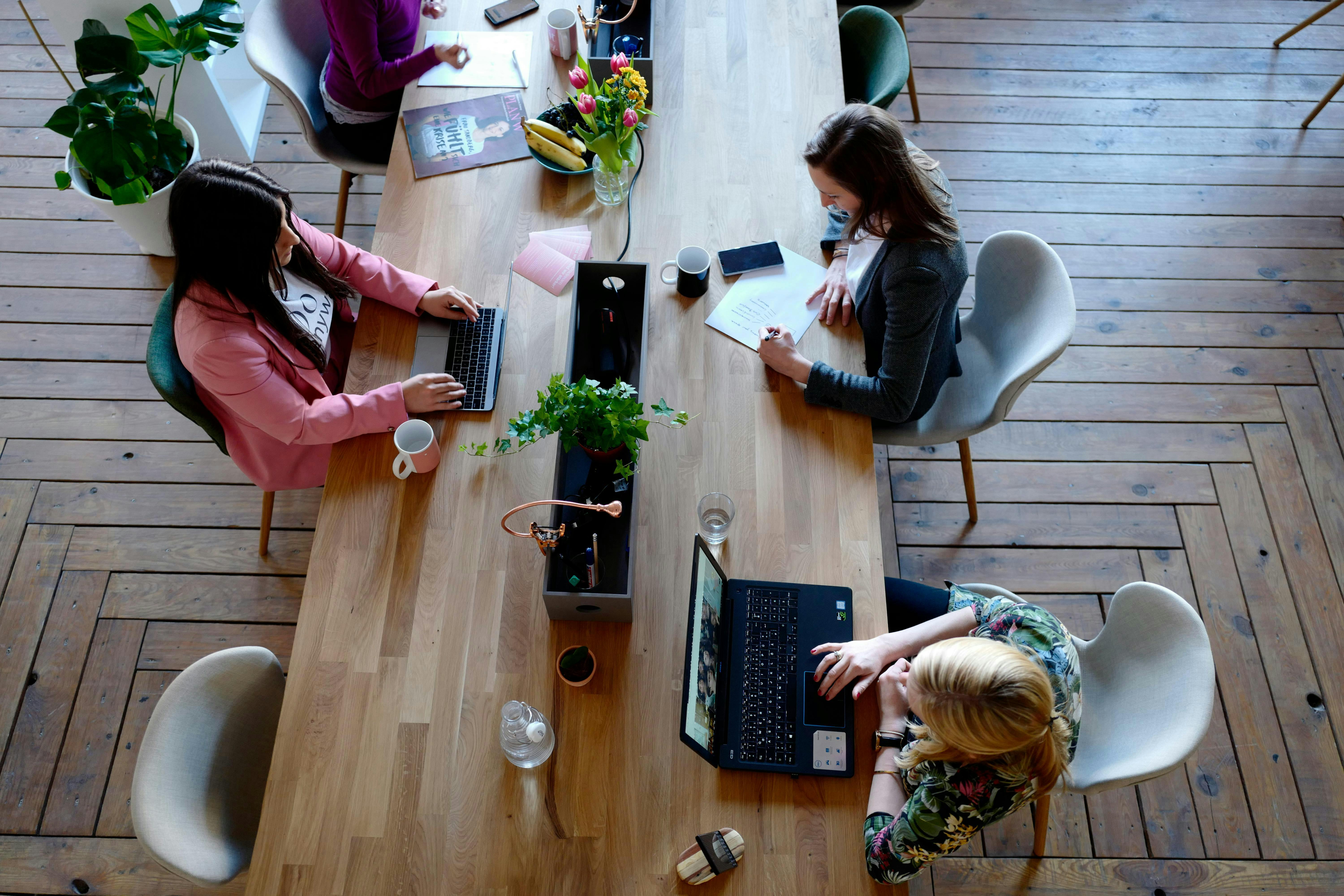 people working at a desk together