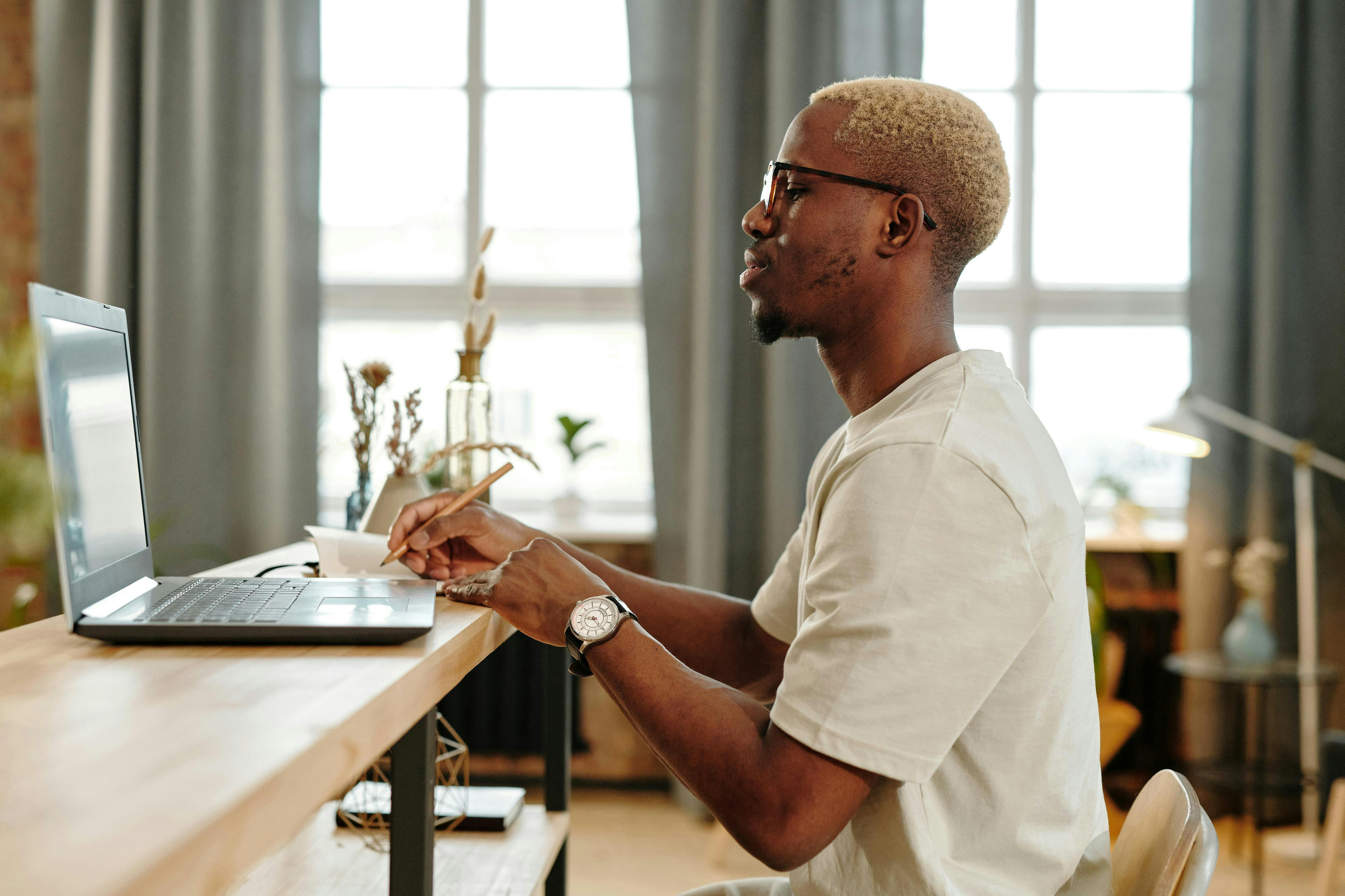 Man taking an exam on the computer