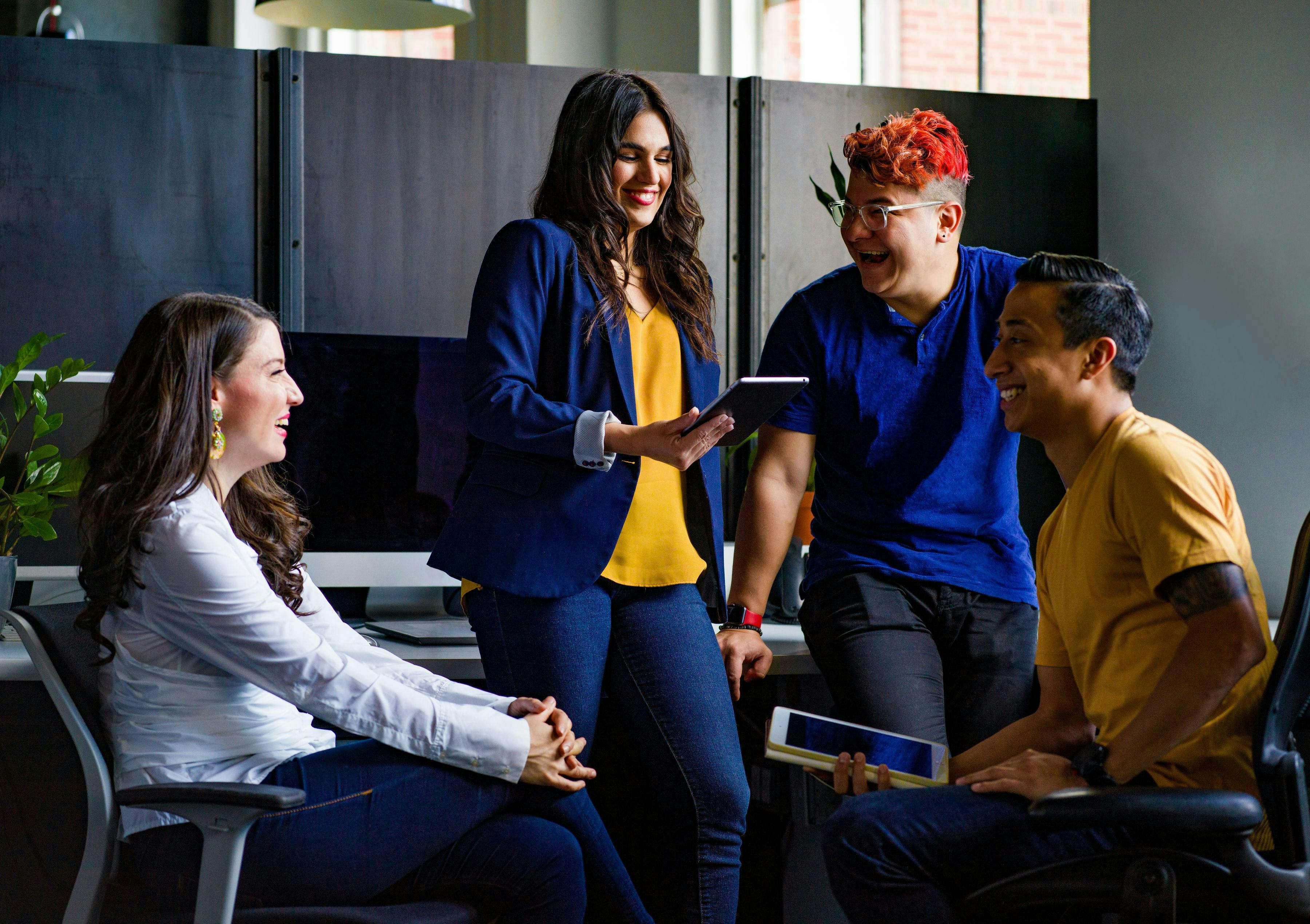 group of workers working together in office