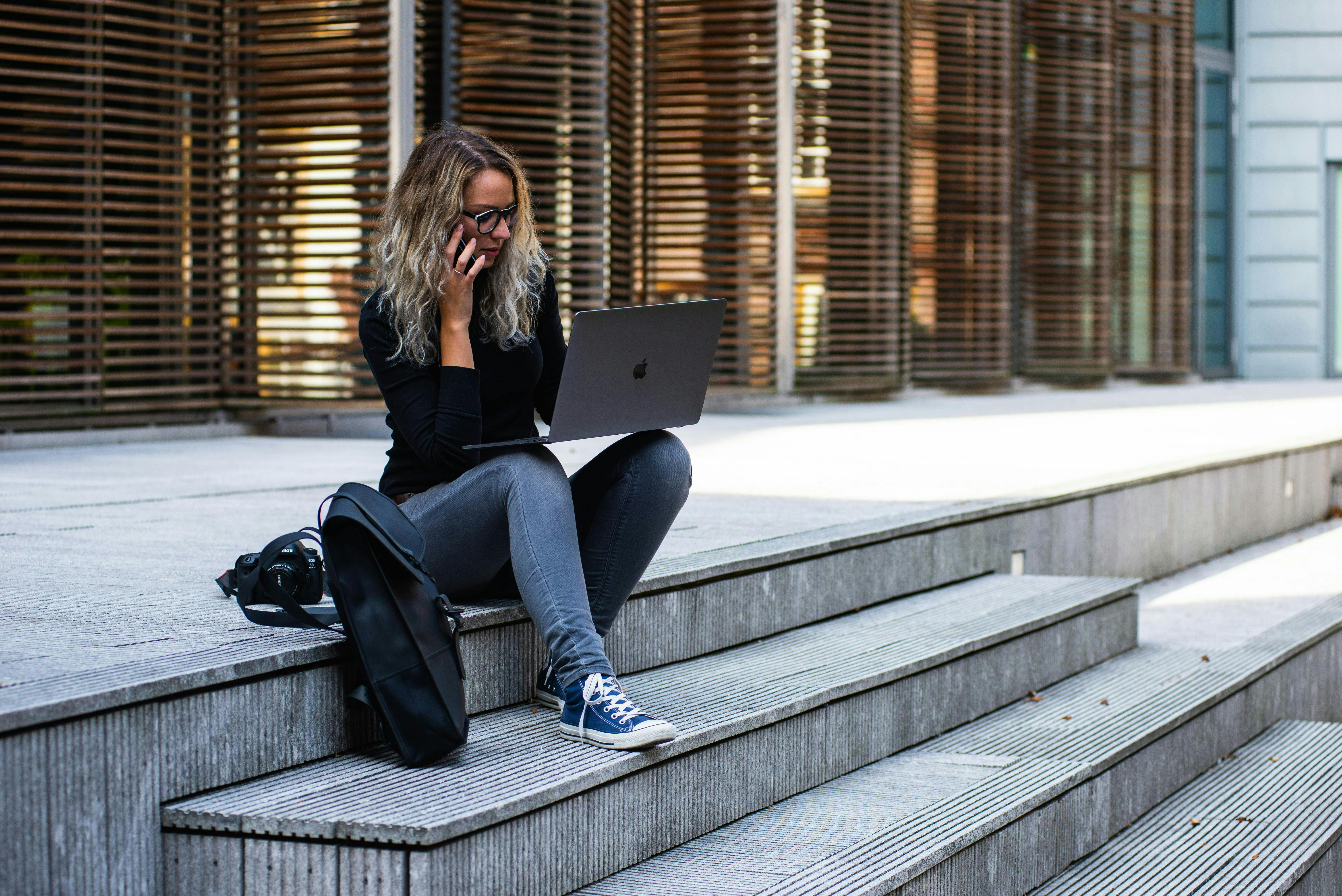 person studying on their computer