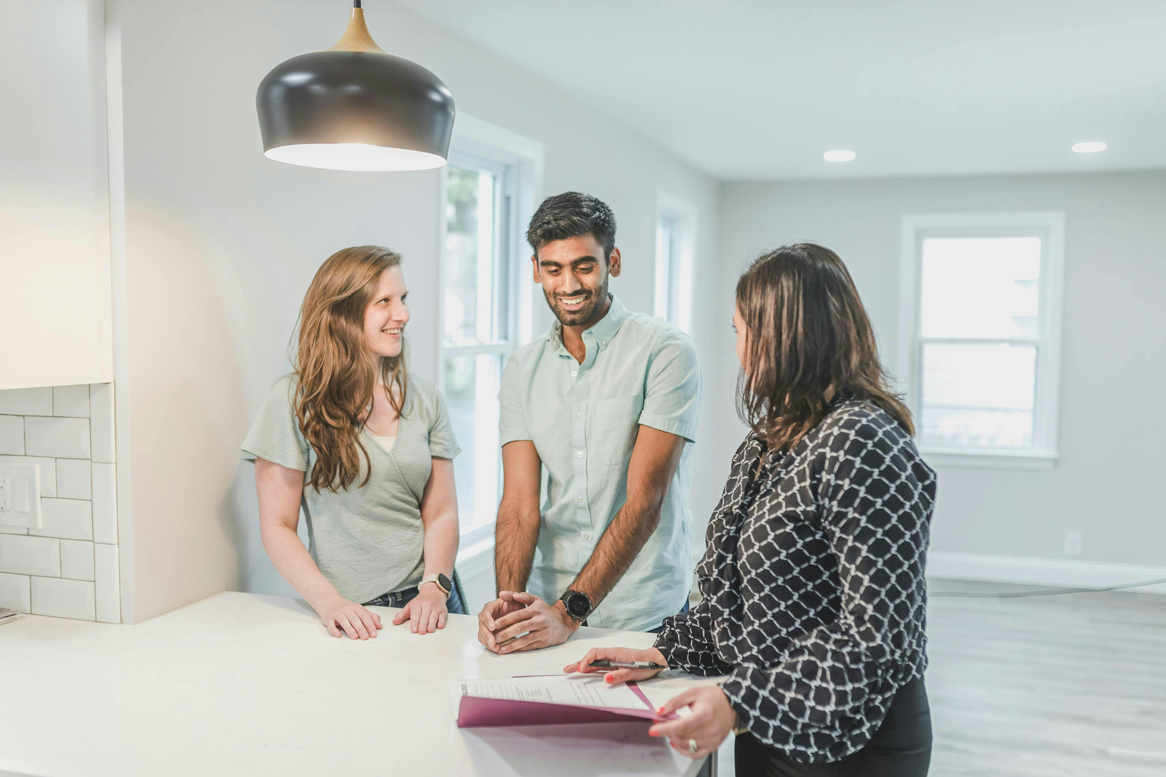 Insurance agent talking with a couple