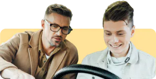 Dad teaching son to drive