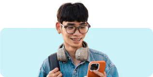 Teen boy looking at his phone