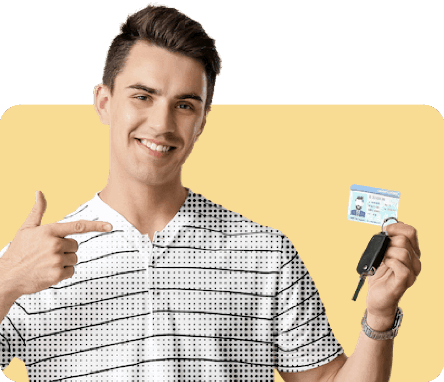 Teen holding car key and new license