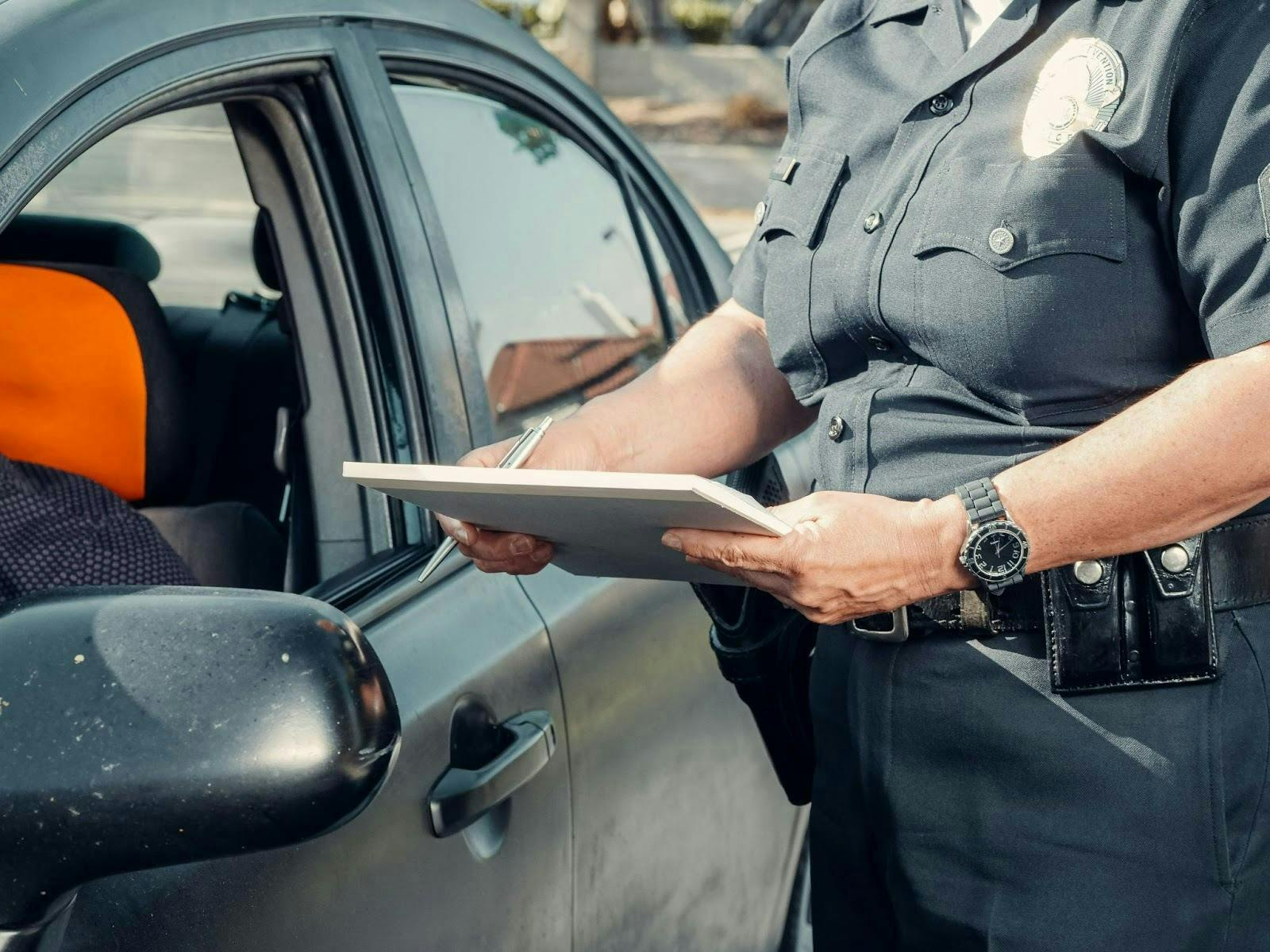Police Officer Giving a Speeding Ticket in Texas