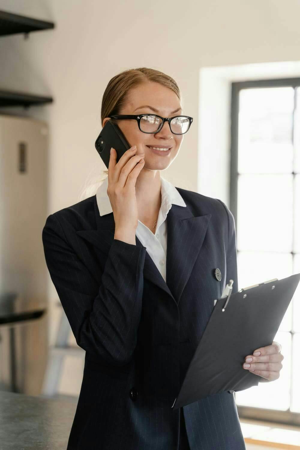 woman on phone and computer